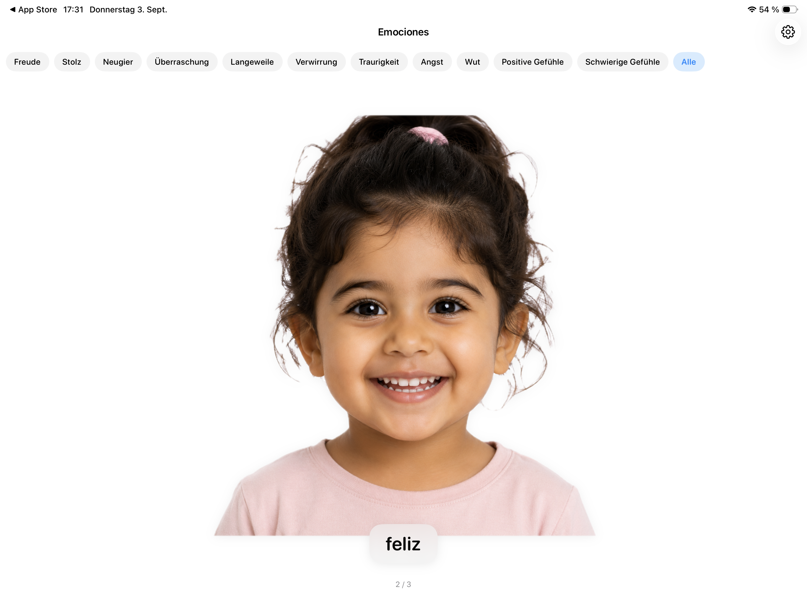 BabbbleBuddy: Gefühlskarte mit einem lachenden Kind und der spanischen Bezeichnung feliz